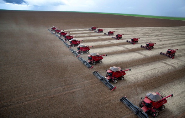 Combines harvest soybeans at the Morro Azul farm near Tangara da Serra, Brazil, one of the areas covered by the Paulson Institute's Sustainable Soy Trade Platform.
